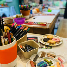 Load image into Gallery viewer, Art workshop materials and biscuits
