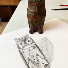 Load image into Gallery viewer, Wooden owl figurine next to a pencil sketch of an owl on a white surface.