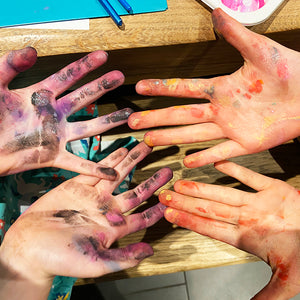 Children's hands with paint