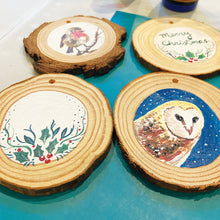Load image into Gallery viewer, Handpainted wood slice Christmas ornaments with festive designs including an owl and a robin
