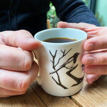 Load image into Gallery viewer, White fine bone china illustrated Joy mug with black coffee
