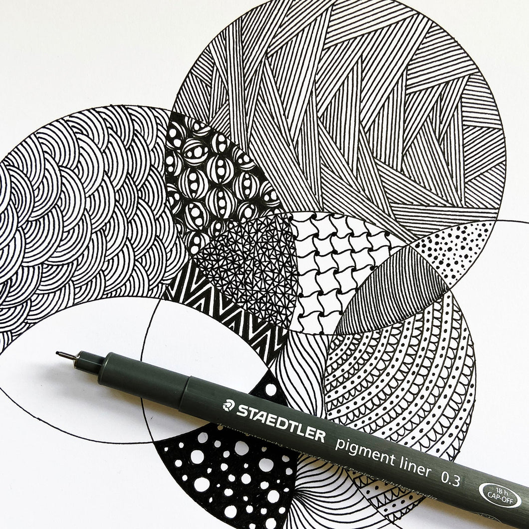 Mindful fineliner patterns in black and white on a white background.